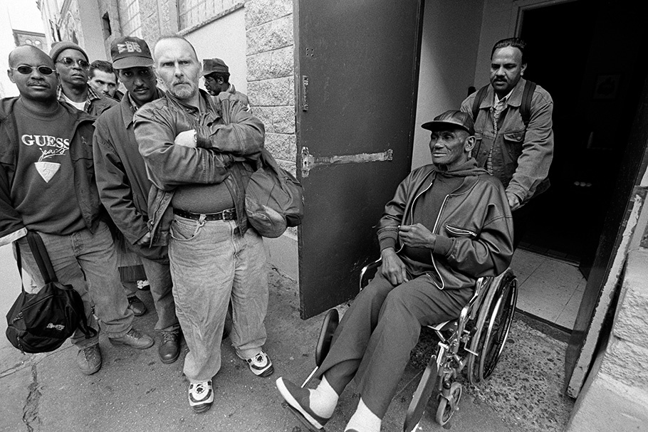 A group of men, with one in a wheelchair.