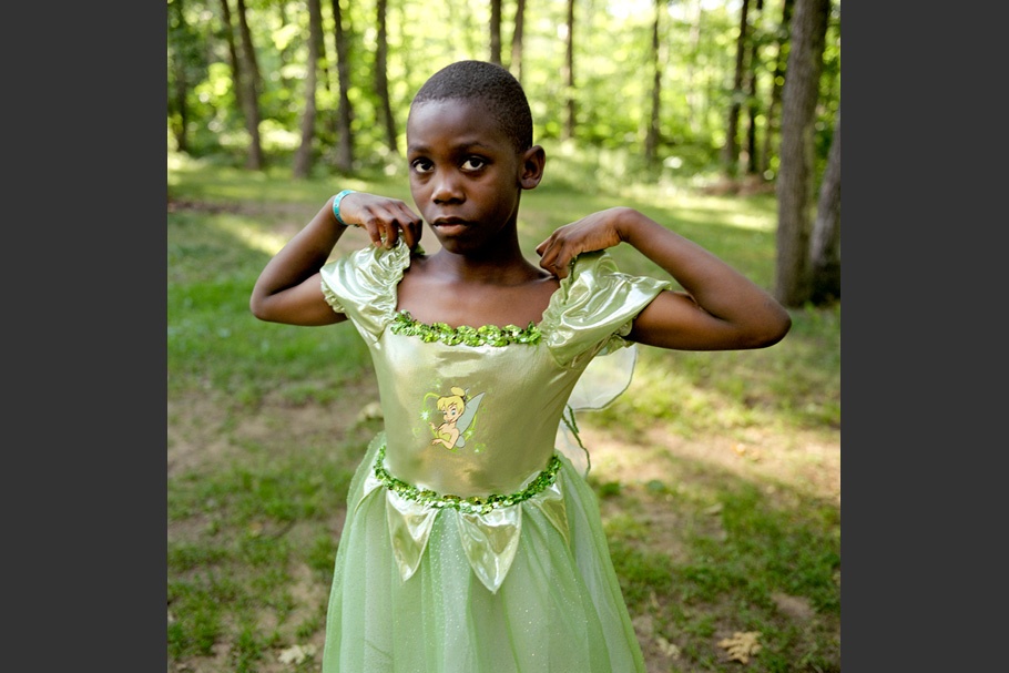 Child in green Tinker Bell dress.