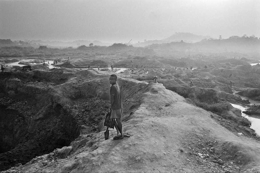 A child overlooking a mine.