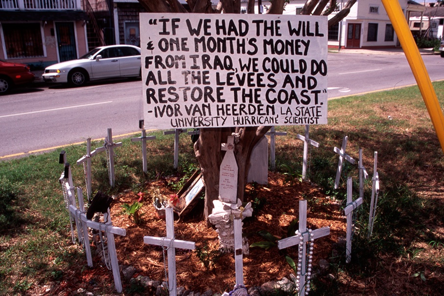 “If we had the will…” sign surrounded by crosses.