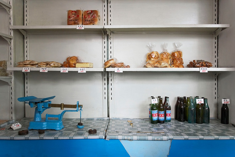 Shelves with bread and scale.