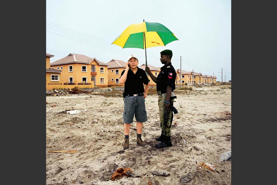 Two men with umbrella.