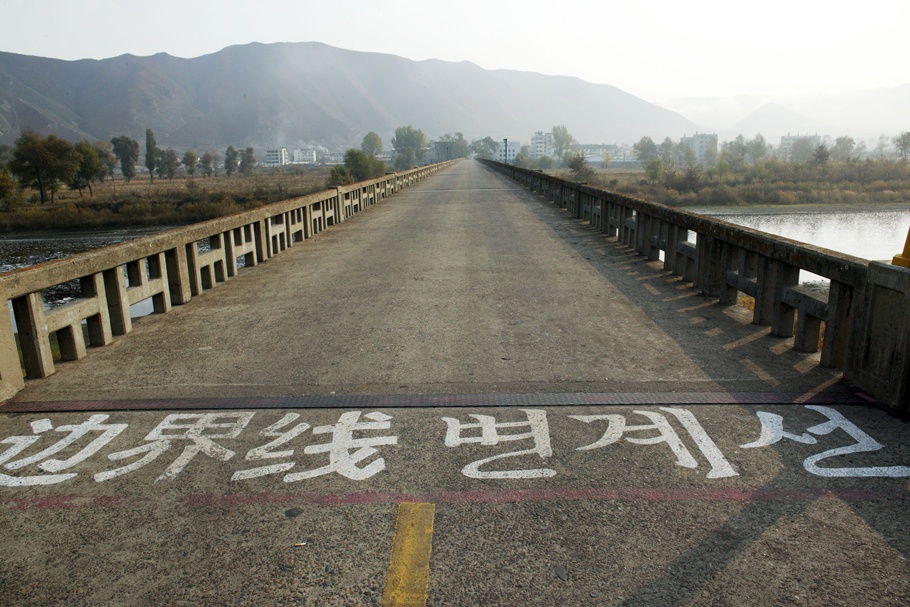An entrance to a bridge that separates China from North Korea.