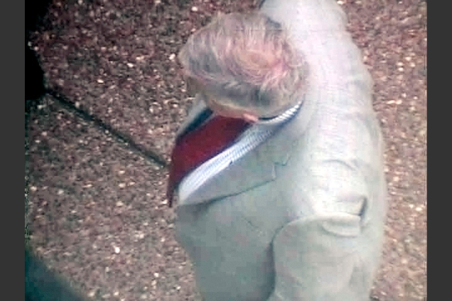 Man with grey suit photographed from above