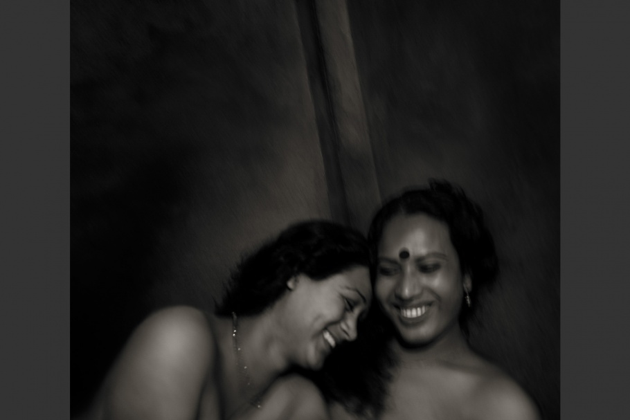 Two Bangladeshi hijra women laugh together