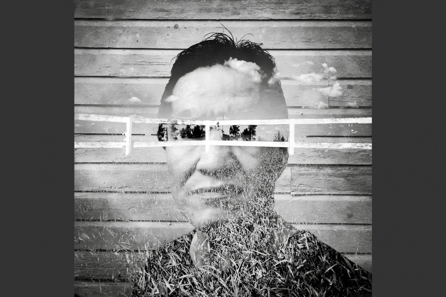 A fence superimposed on a person's face.