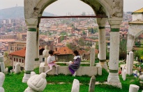 Children playing in a cemetery.