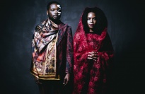 James Jean and Patrice Worthy wearing face paint and traditional clothing